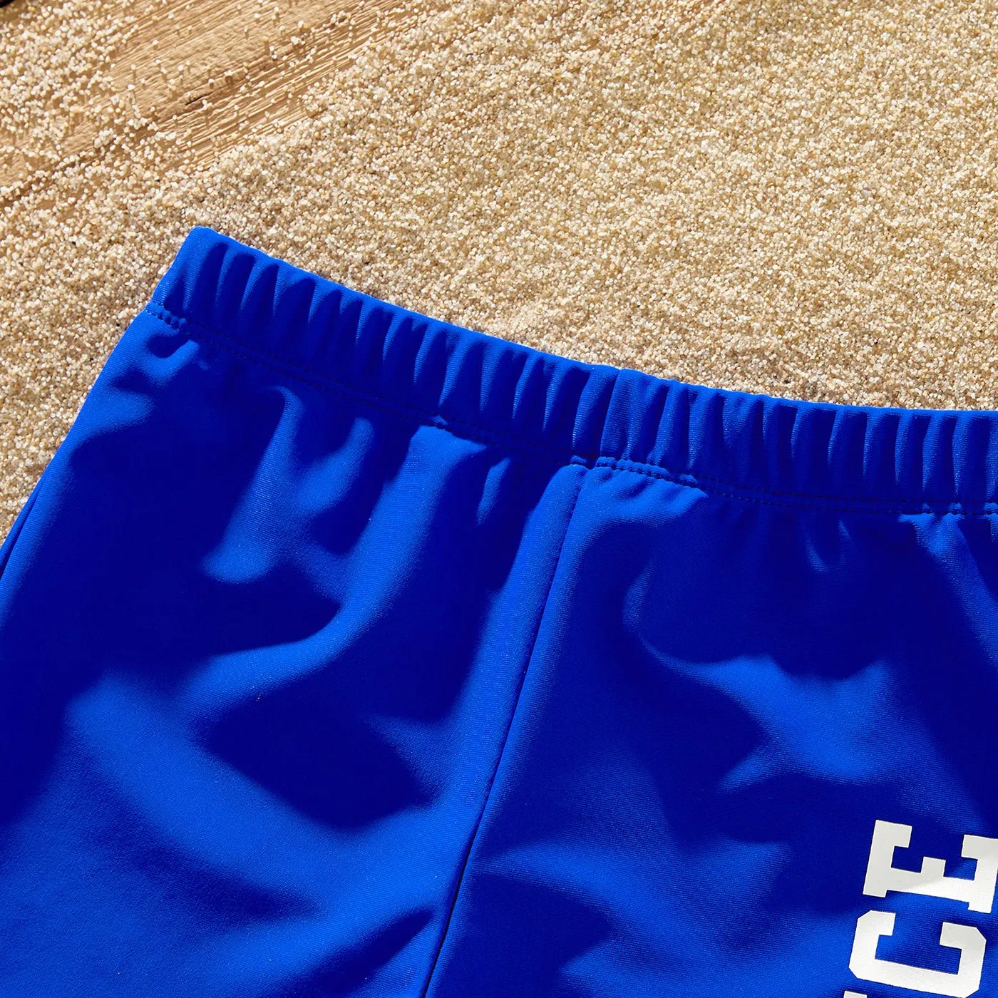 Family Matching Blue Ruffle Trim Two-piece Swimsuit and Letter Print Swim Trunks